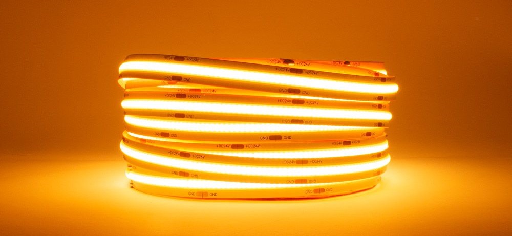 The coiled LED strip MI-LED-CSL1N01H illuminates a white background, creating a warm and bright atmosphere